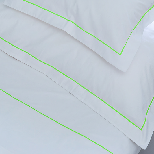 Neon green bedding with straight stitch detail