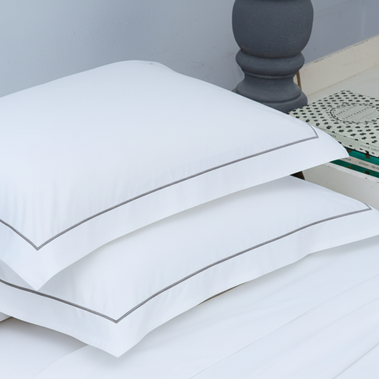 White pillowcase with straight grey trim